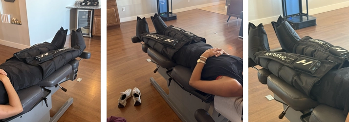 A patient laying on table with NormaTec Compression Therapy boots on.